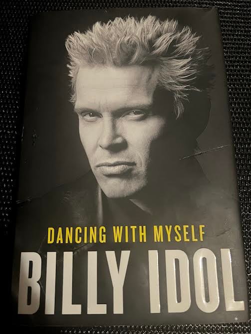 The reporter’s well-worn copy of Billy Idol’s autobiography, “Dancing with Myself.” Its title comes from his song of the same name.